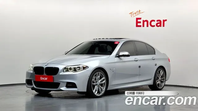 BMW 5-Series 2015 — photo 1