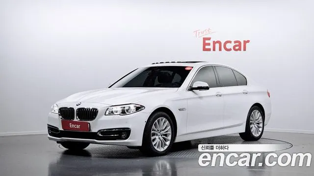 BMW 5-Series 2014 — photo 1