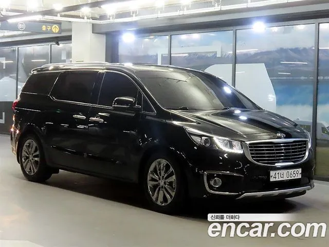 Kia Canival 2017 — photo 1