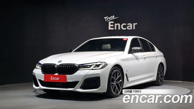 BMW 5-Series 2022 — photo 1