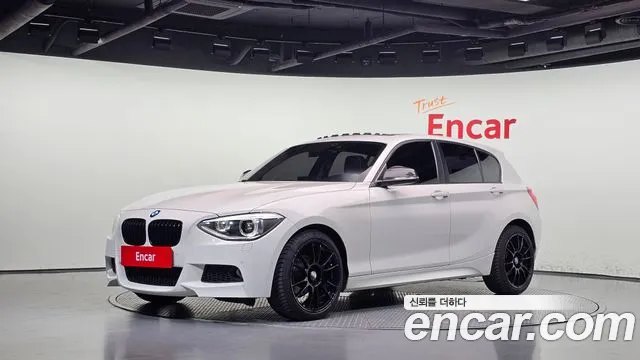 BMW 1-Series 2014 — photo 1