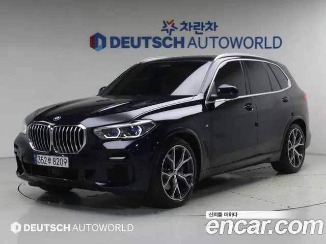 BMW X5 2022 — photo 1