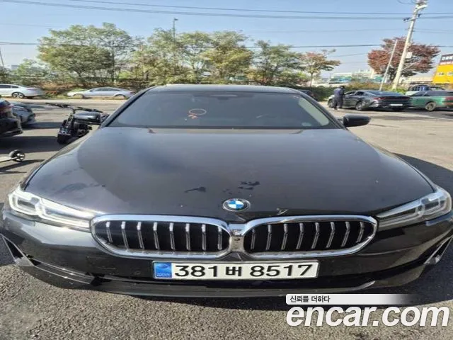 BMW 5-Series 2023 — photo 1