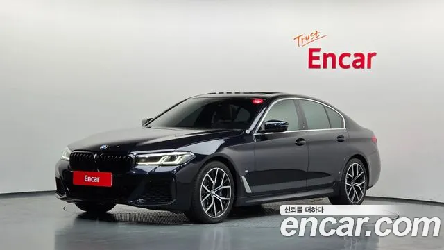 BMW 5-Series 2021 — photo 1