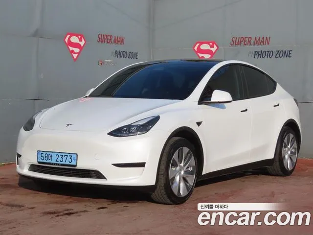 Tesla Model Y 2024 — photo 1