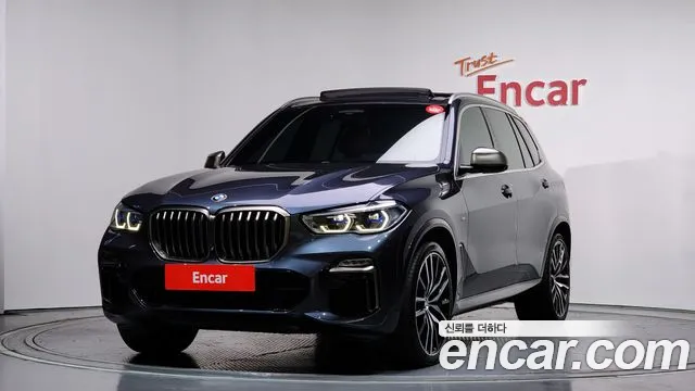 BMW X5 2021 — photo 1