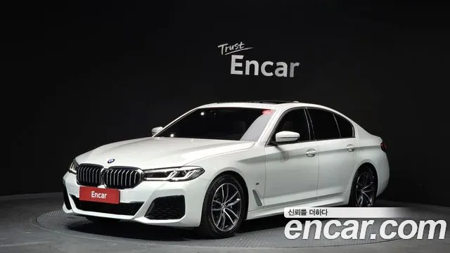 BMW 5-Series 2022 — photo 1