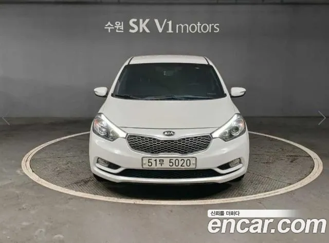 Kia K3 2013 — photo 1