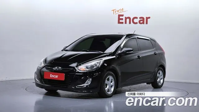 Hyundai Accent 2014 — photo 1