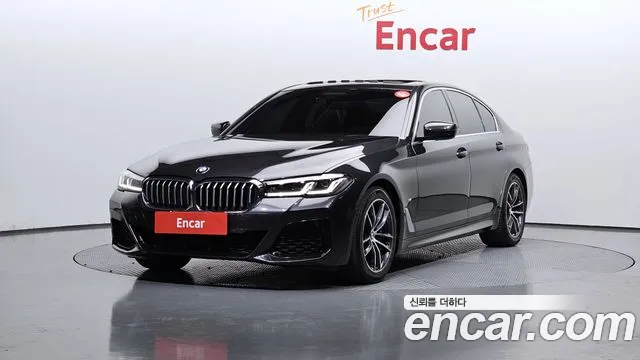 BMW 5-Series 2021 — photo 1
