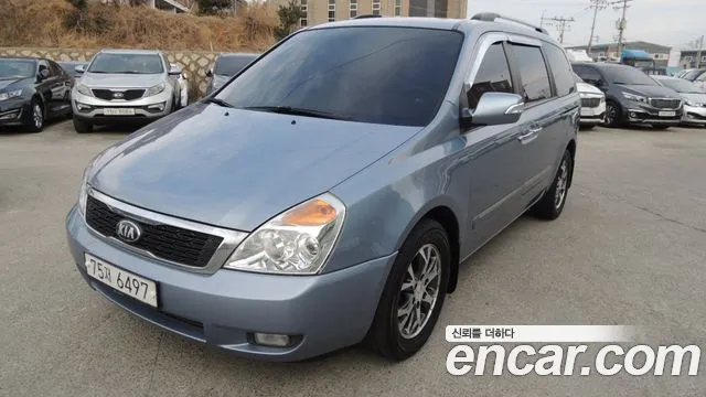 Kia Canival 2013 — photo 1