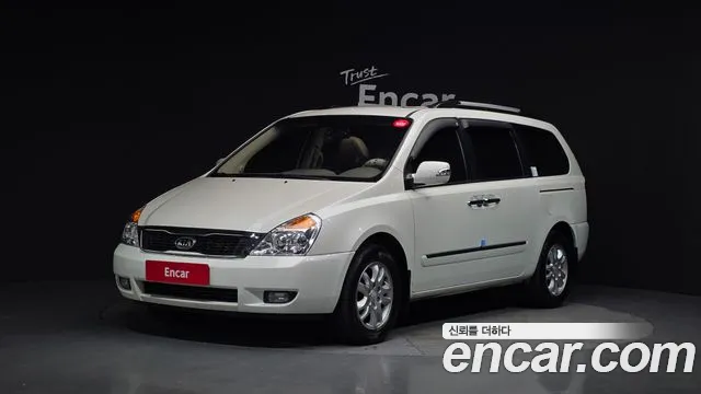 Kia Canival 2011 — photo 1