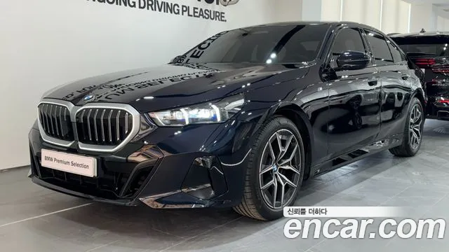 BMW 5-Series 2024 — photo 1