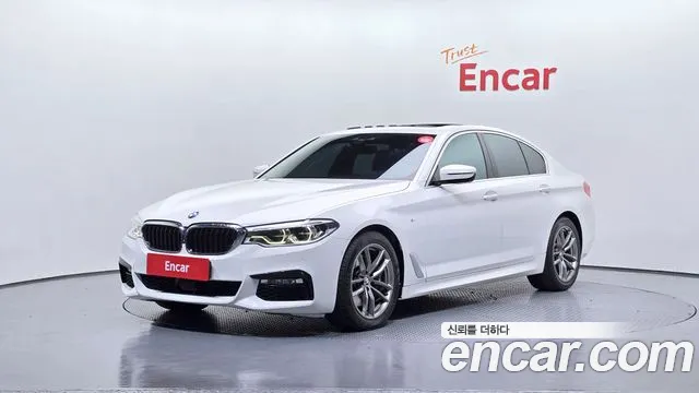 BMW 5-Series 2018 — photo 1