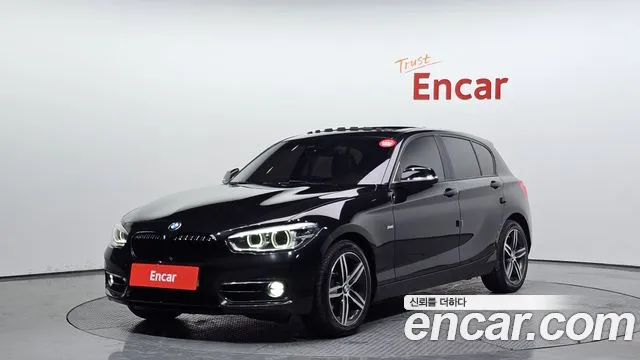 BMW 1-Series 2018 — photo 1