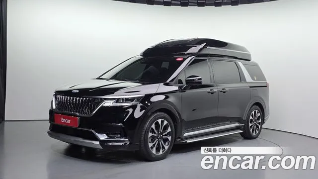 Kia Canival 2021 — photo 1