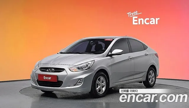 Hyundai Accent 2012 — photo 1
