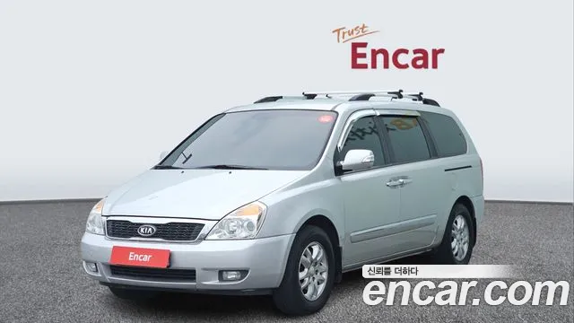 Kia Canival 2012 — photo 1