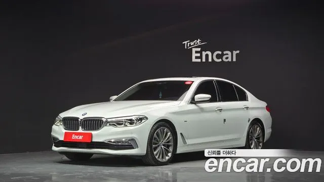 BMW 5-Series 2018 — photo 1