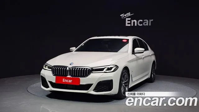 BMW 5-Series 2021 — photo 1