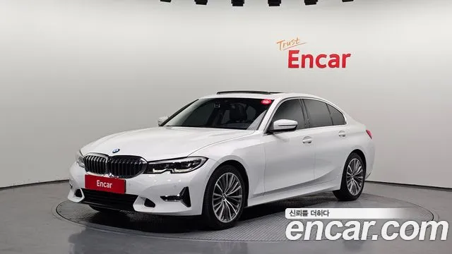 BMW 3-Series 2022 — photo 1