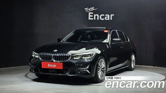 BMW 3-Series 2022 — photo 1
