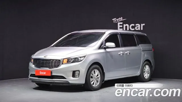Kia Canival 2015 — photo 1