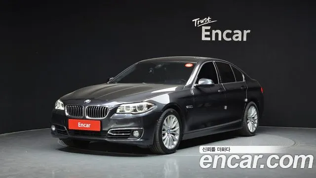 BMW 5-Series 2015 — photo 1