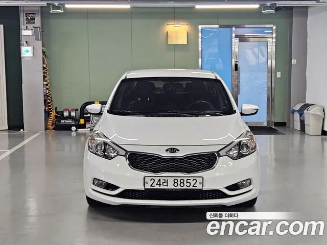 Kia K3 2013 — photo 1