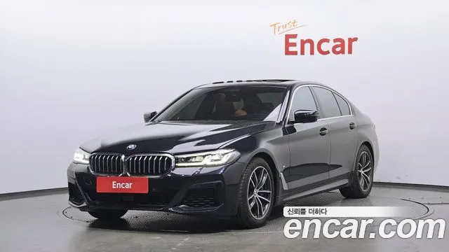 BMW 5-Series 2022 — photo 1
