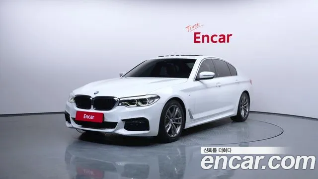 BMW 5-Series 2019 — photo 1