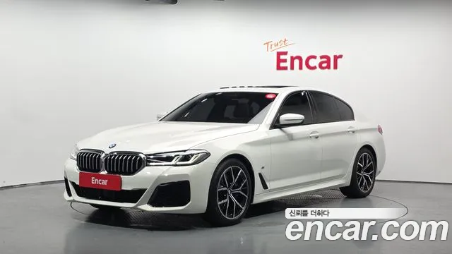 BMW 5-Series 2023 — photo 1