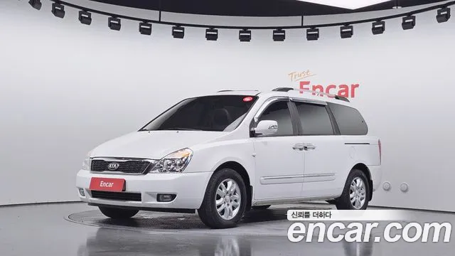 Kia Canival 2013 — photo 1