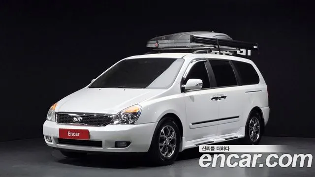 Kia Canival 2014 — photo 1