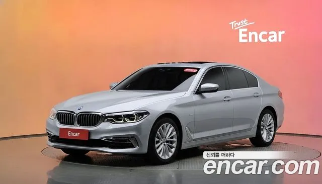 BMW 5-Series 2018 — photo 1