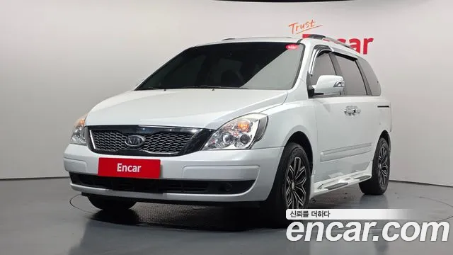 Kia Canival 2012 — photo 1