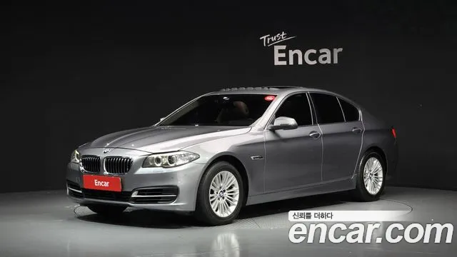 BMW 5-Series 2015 — photo 1