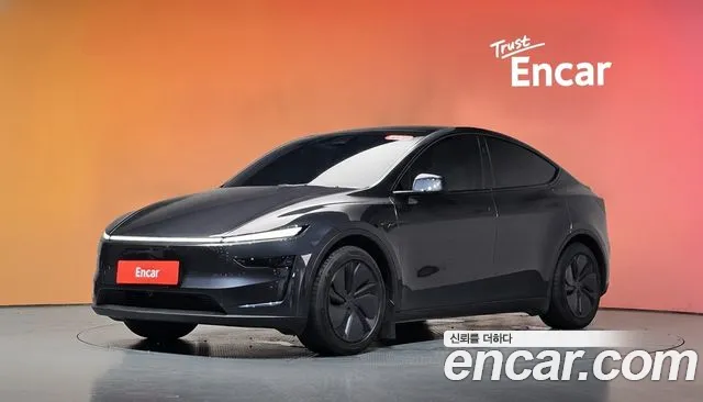 Tesla Model Y 2025 — photo 1