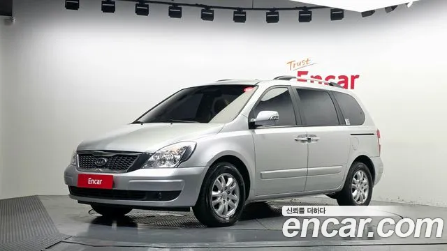 Kia Canival 2011 — photo 1