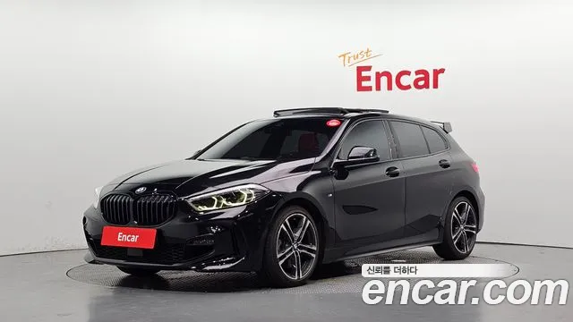 BMW 1-Series 2022 — photo 1
