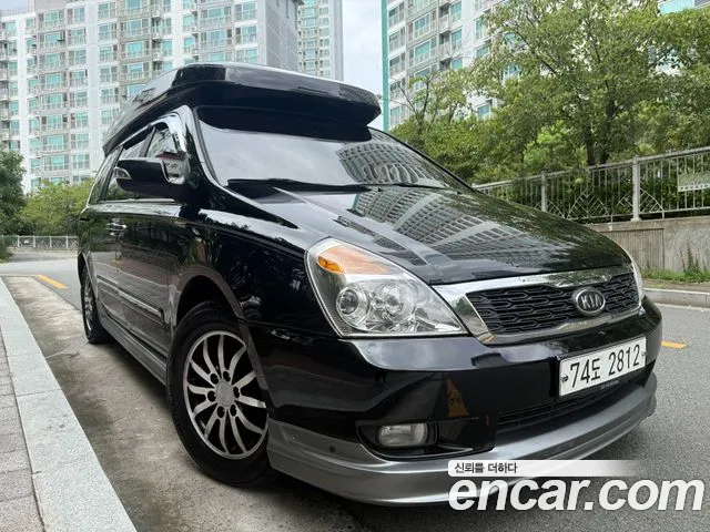 Kia Canival 2012 — photo 1