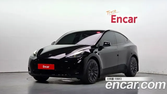 Tesla Model Y 2024 — photo 1