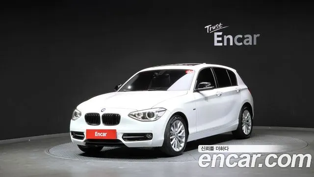 BMW 1-Series 2015 — photo 1