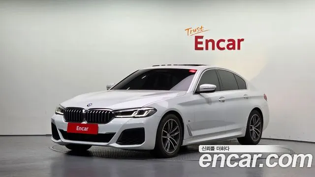 BMW 5-Series 2023 — photo 1