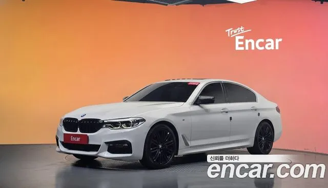 BMW 5-Series 2018 — photo 1