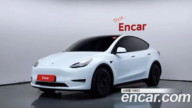 Tesla Model Y 2024 — photo 1