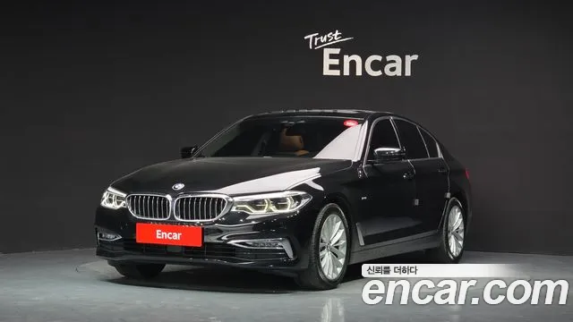 BMW 5-Series 2018 — photo 1