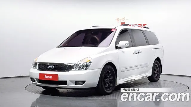 Kia Canival 2013 — photo 1