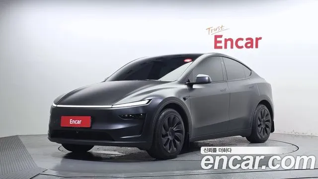 Tesla Model Y 2025 — photo 1