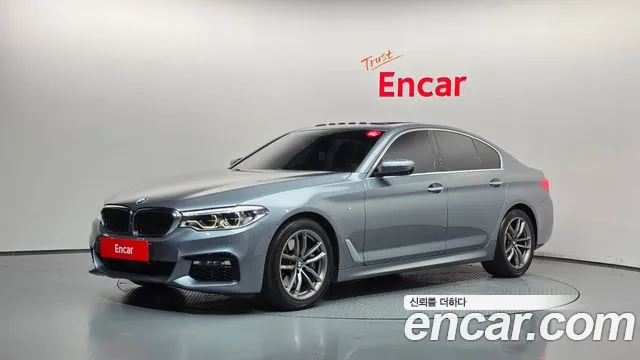 BMW 5-Series 2018 — photo 1